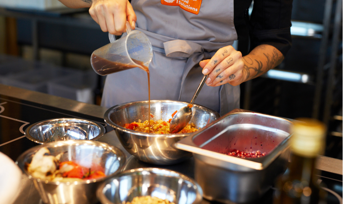 Chef Thays roasting the ingredients for her top dish
